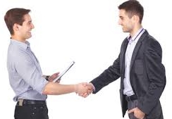 handshakes - NARSOL Two men in business attire shake hands against a white background, signaling a deal or agreement.